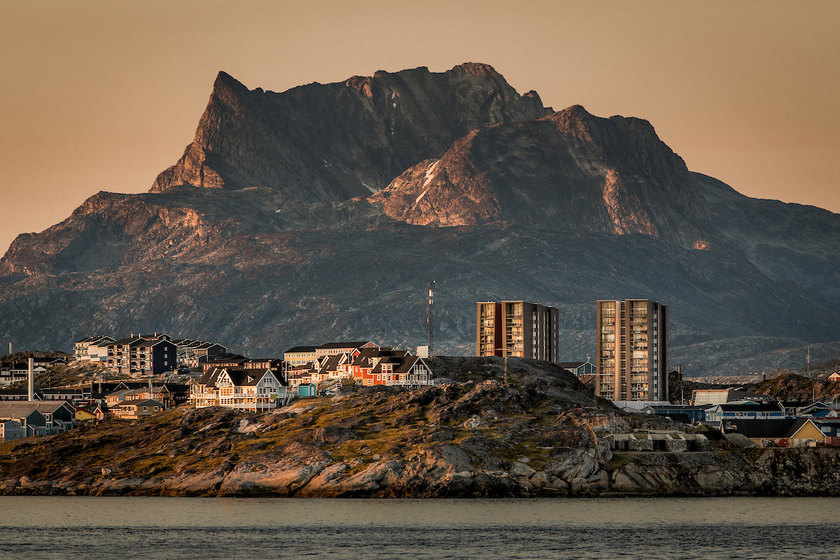 Buildings in Nuuk with the mountain Sermitsiaq in the background at sunset in Greenland.jpg